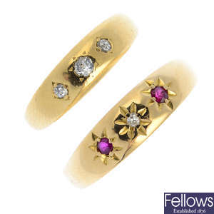 Two mid 20th century 18ct gold diamond and ruby three-stone rings.