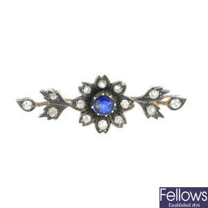 A late Victorian silver and gold, sapphire and diamond floral brooch.