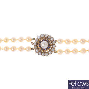 A two-row cultured pearl necklace.