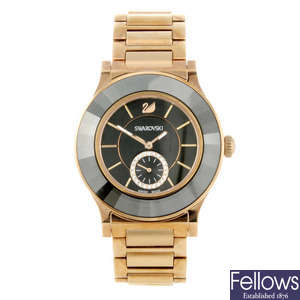SWAROVSKI - a lady's rose gold plated Octea Classica bracelet watch.