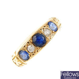 An Edwardian 18ct gold sapphire and diamond dress ring.