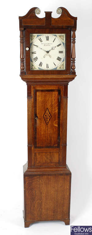 An early 19th century inlaid oak-cased 30-hour longcase clock.