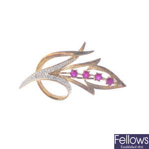 A 9ct gold diamond and ruby floral brooch.