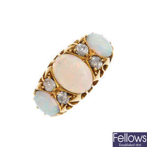 An Edwardian 18ct gold opal three-stone and diamond ring.