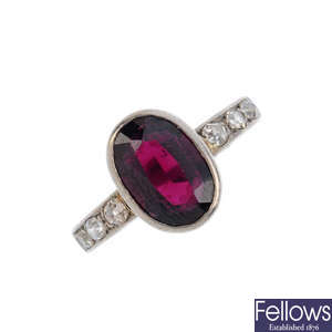 A mid 20th century 18ct gold garnet and diamond ring.