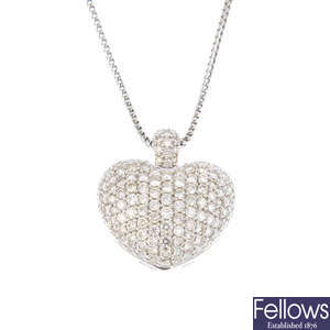 An 18ct gold diamond heart pendant, with chain.