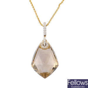 An 18ct gold smoky quartz and diamond pendant, with chain.