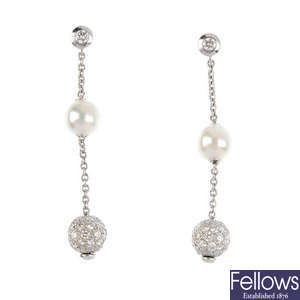 MIKIMOTO - a pair of 18ct gold diamond and cultured pearl earrings.