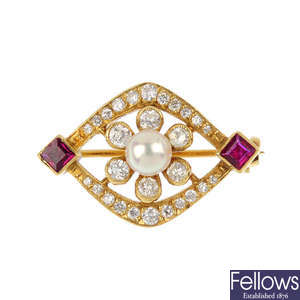 An 18ct gold cultured pearl, ruby and diamond brooch.