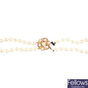 A cultured pearl two-row necklace, with 9ct gold clasp.