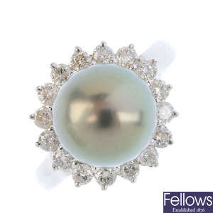 A diamond and cultured pearl cluster ring.