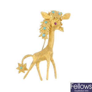A mid 20th century 18ct gold gem-set giraffe brooch.