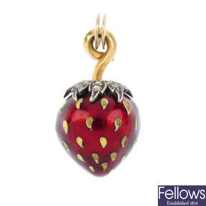 An enamel and diamond strawberry pendant.