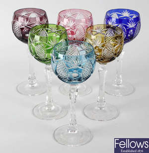 A set of six cut wine glasses.