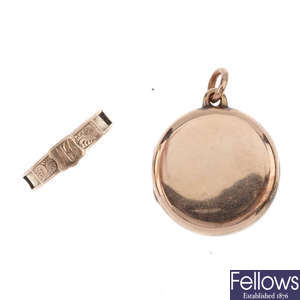 An early 20th century gold front and back locket and an early 20th century 9ct gold memorial ring.