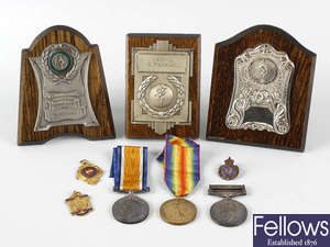 A selection of medals and trophies 