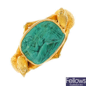 A late 19th century 18ct gold carved malachite ring.