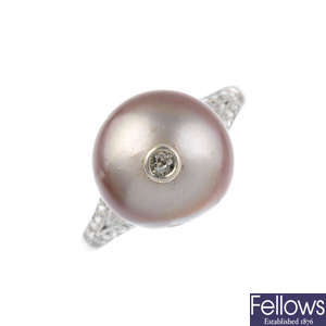 A natural saltwater pearl and diamond ring.