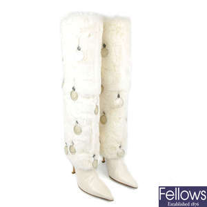 JIMMY CHOO - a pair of white coney fur knee-high boots.