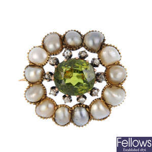A demantoid garnet, split pearl and diamond brooch.