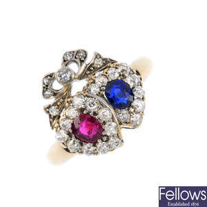 A late Victorian silver and gold, ruby, sapphire and diamond lover's hearts ring.