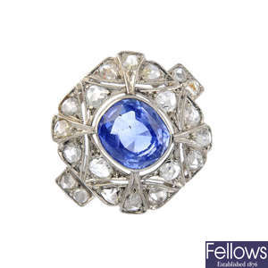 A mid 20th century platinum Ceylon sapphire and diamond dress ring.