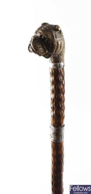 A 19th century carved wooden walking cane.