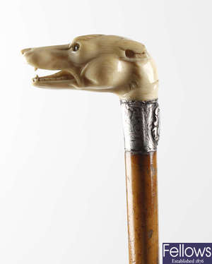A 19th century carved ivory handled walking cane.