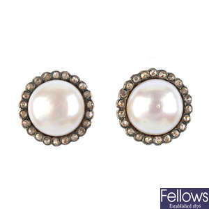 A pair of cultured pearl and diamond cluster earrings.