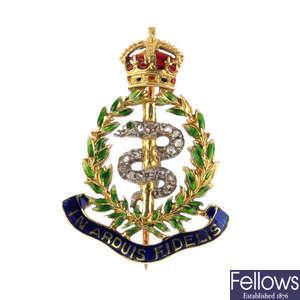 An early 20th century Royal Medical corps diamond and enamel brooch.