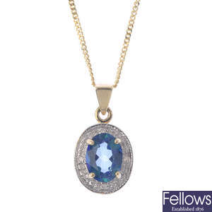 A 9ct gold coated topaz pendant, with chain.
