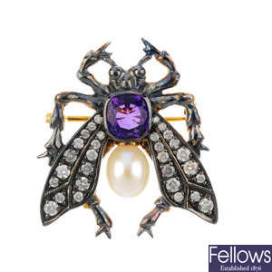 A gem-set winged insect brooch.