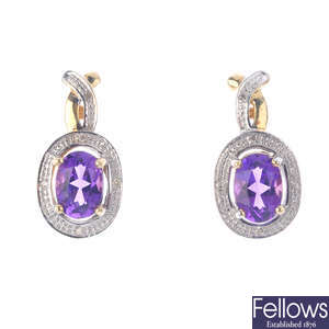 A pair of 9ct gold amethyst and diamond cluster earrings.