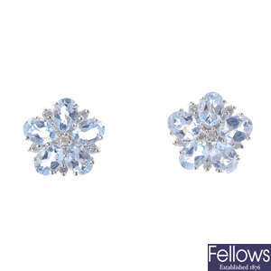 A pair of aquamarine and diamond floral cluster stud earrings.