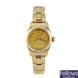 ROLEX - a lady's 14ct yellow gold Oyster Perpetual bracelet watch.