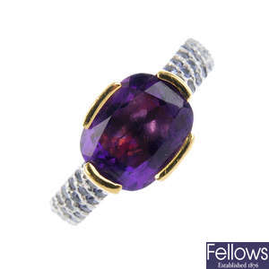 An 18ct gold sapphire and purple gem dress ring.