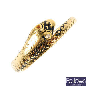 An early Victorian gold enamel and diamond snake ring.