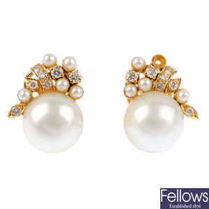 A pair of imitation mabe pearl, cultured pearl and diamond earrings.