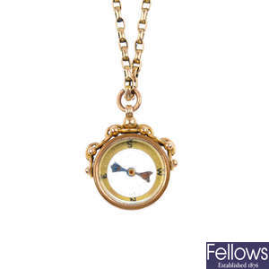 An early 20th century 9ct gold compass pendant, with chain.