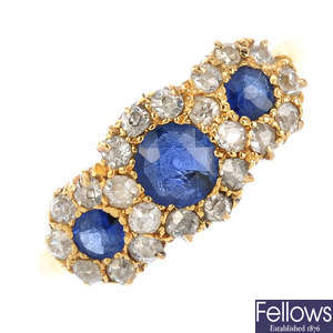 An Edwardian 18ct gold sapphire and diamond triple cluster ring.