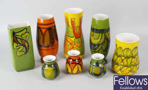 Eight various Poole pottery Delphus pattern vases.