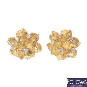 A pair of diamond floral clip earrings.