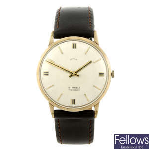 SHIELD - a gentleman's 9ct yellow gold wrist watch.