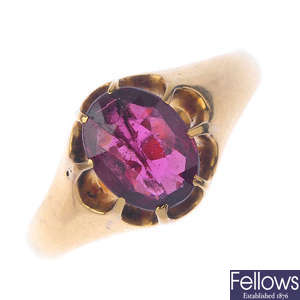 A late Victorian 18ct gold garnet single-stone ring.