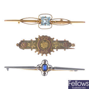 A late Victorian brooch and two early 20th century gem-set brooches.