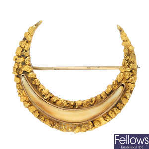 A late Victorian Canadian 'gold rush' crescent brooch.