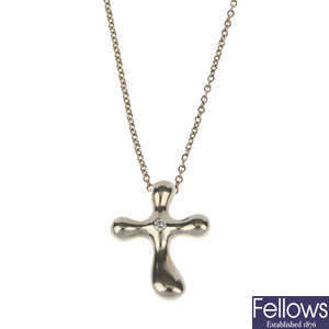 TIFFANY & CO. - a diamond cross pendant.