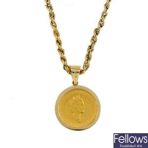 A Canadian coin pendant, with chain.