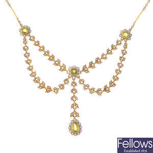 An Edwardian gold, peridot and split pearl necklace.