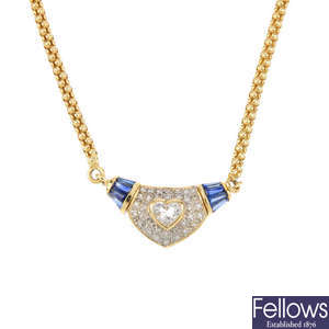 A topaz, diamond and sapphire necklace.
